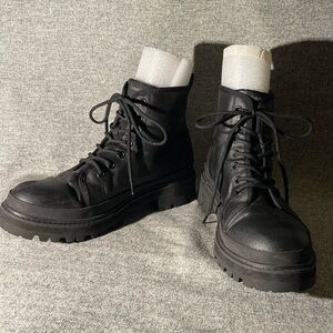 Calvin Klein Lug Sole Boots.